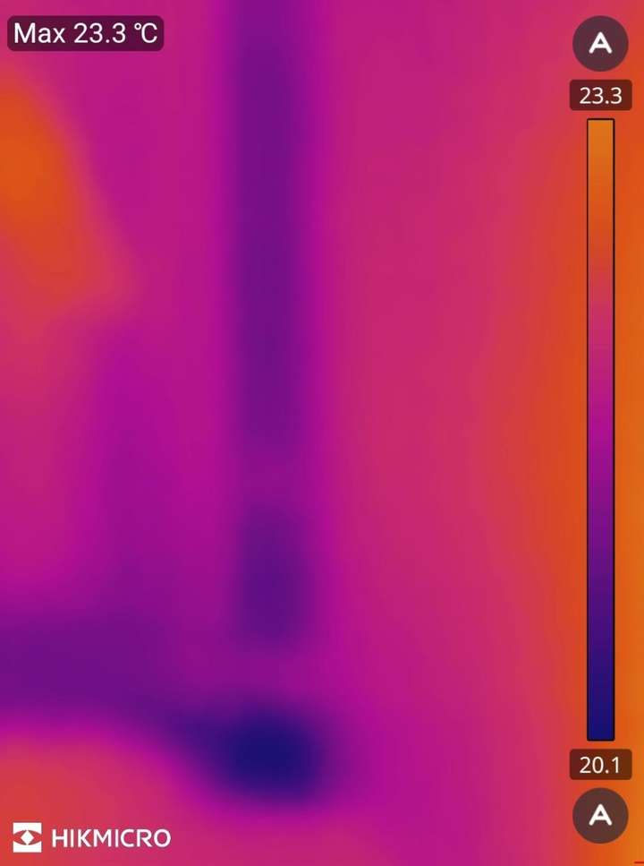 Thermal image of a window, showing where the cold is and where it is not.